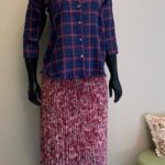 Pleated skirt and shirt combo