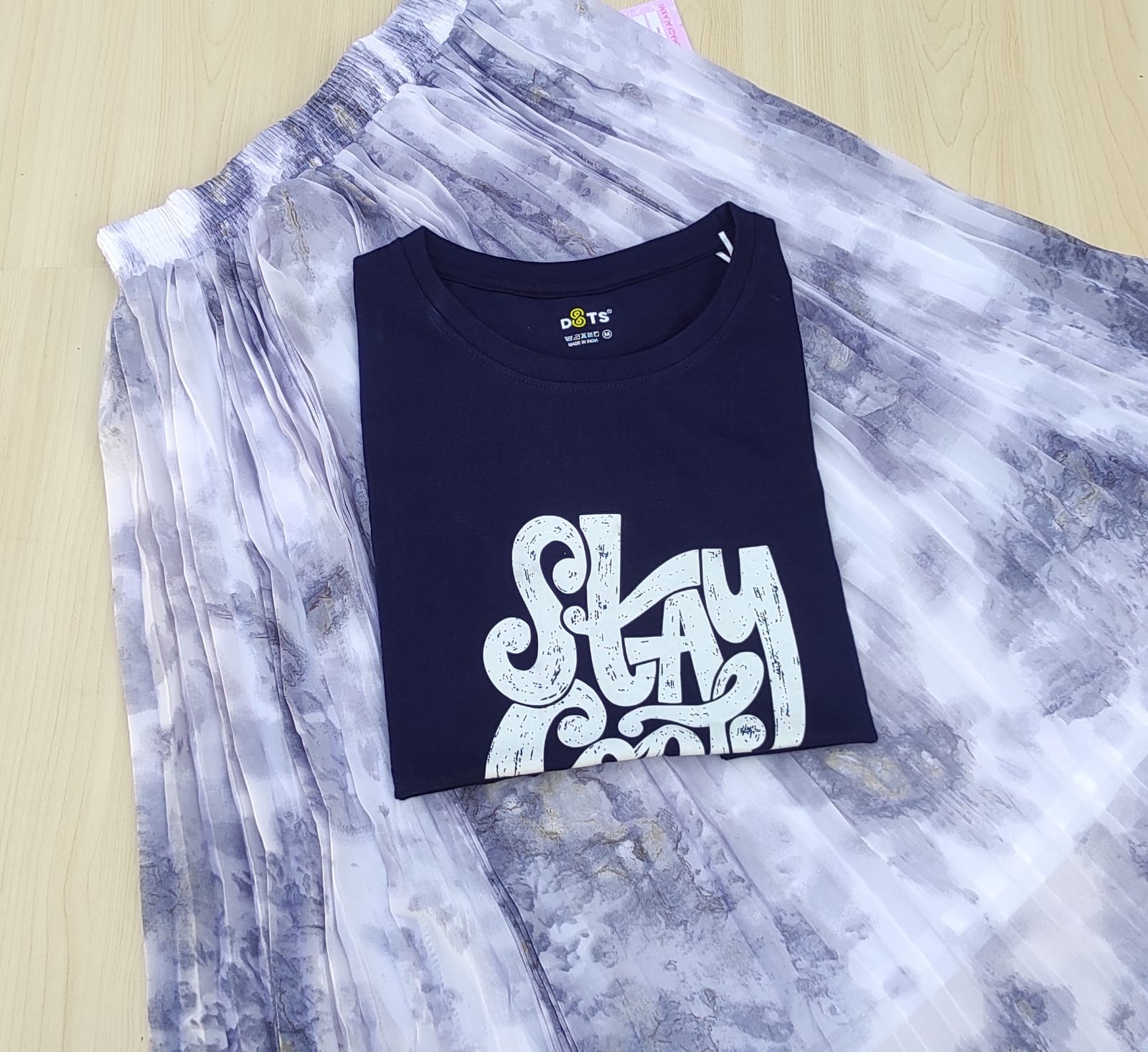 WhatsApp Image 2026-04-13 at 10.41.34 AM Solid tshirt and pleated skirt Combo - Image 1